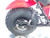 TM MB200-2 Mini Bike, close-up of the rear wheel, suspension, and chain drive system.