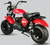 TM MB200-2 Mini Bike, red mini motorcycle with large off-road tires, black seat, and sturdy frame.