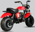 TM MB200-2 Mini Bike, red mini motorcycle with rugged off-road tires, black seat, and handlebars on a plain gray background.