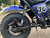 TM Hurricane 200X Upgraded Mini Bike, detailed side view showcasing large off-road tire, suspension system, and frame with racing number 16.
