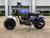 TM Hurricane 200X Upgraded Mini Bike, blue and black mini dirt bike with large tires and a sturdy frame.