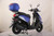 TM Flash 50 Scooter Moped, blue and black scooter with top-mounted storage box and digital dashboard DISPLAY.