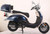 TM Sorento 200A Scooter Moped, blue and white vintage-style scooter with a top storage box, chrome handlebars, and black seat.