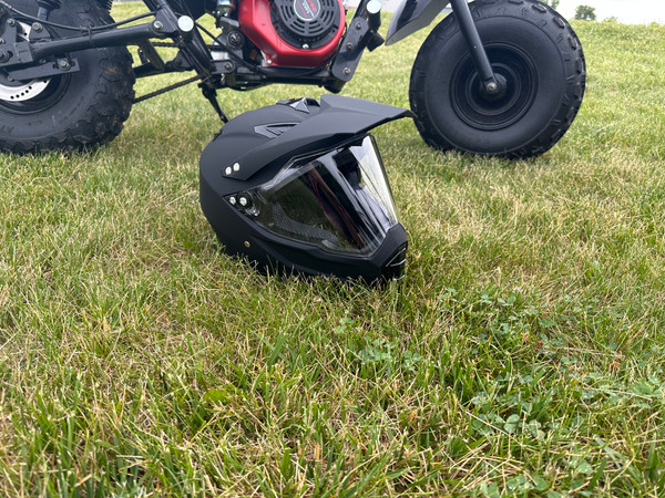 Matte Black adult helmet for safety while riding Trailmaster go karts