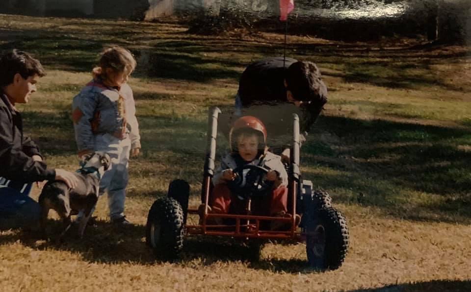 Kim on her first go kart age 2- a real go kart master