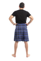 Man wearing a bespoke kilt in dark green and navy tartan with yellow lines, back view