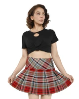 Criss-cross pleat skirt in red, grey and white tartan worn by a woman, front view