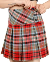 Close-up of red and blue tartan skirt waistband buttons and crossover pleats