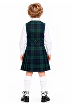 Back view of boy in green and navy tartan kilt and matching waistcoat