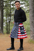 American Flag Kilt with stars-and-stripes panels and a USA pocket, worn with a black shirt outdoors