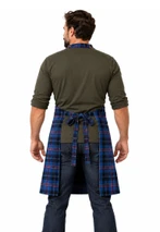 Grilling apron in blue and navy tartan tied at the back, back view on a man