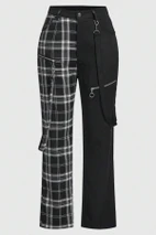 Black and white plaid utility pants laid flat with chains and zips