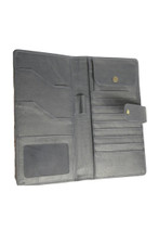 Inside of a tartan travel wallet, grey interior with card slots, pockets and pen loop