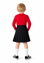 Back view of boy in black kids utility kilt with red top and white socks