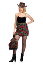 Woman with a zip rucksack in red, green and yellow tartan, matching hat and skirt