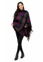 Women's tartan poncho in dark green, navy and red plaid with fringe, side angle