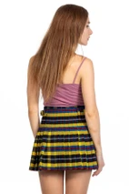 Back view of woman in yellow and black tartan mini kilt showing pleats