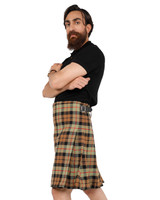 Man in tan, brown and black tartan kilt, side view with arms crossed