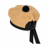 Khaki Balmoral bonnet with black pompom, black band and ribbon tails