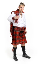 Man in a Royal Stewart kilt with fly plaid, sporran and ghillie shirt