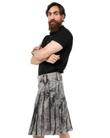Man in a grey acid-wash rustic denim kilt, angled view with arms crossed