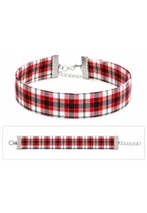 Tartan choker in red, black and white plaid shown fastened and laid flat with chain clasp