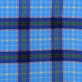 Close-up of red and green tartan fabric with blue, yellow and purple lines