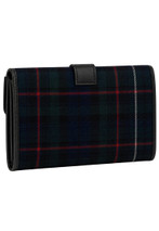 Back of a tartan wallet in navy, green and red plaid with black trim