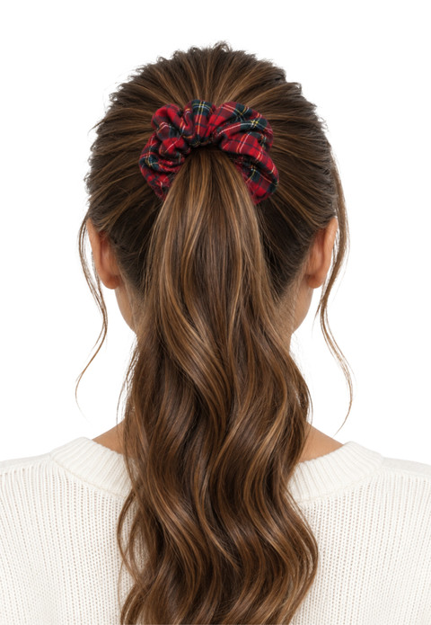Tartan scrunchie in red and green plaid on a woman's ponytail, back view