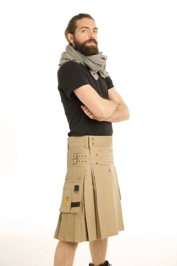 Classic utility kilt in khaki with cargo pocket, front view on man