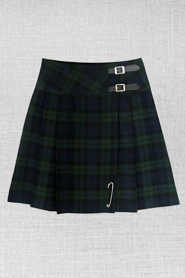 Navy and green tartan kilt laid flat with buckle straps and kilt pin