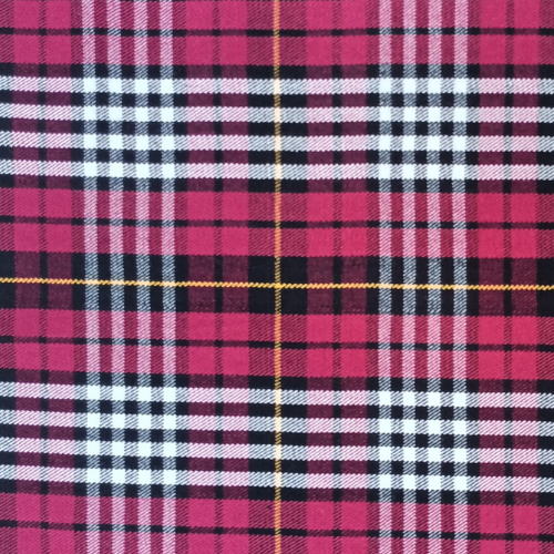 Close-up of red tartan fabric with dark green and blue checks for a bespoke kilt
