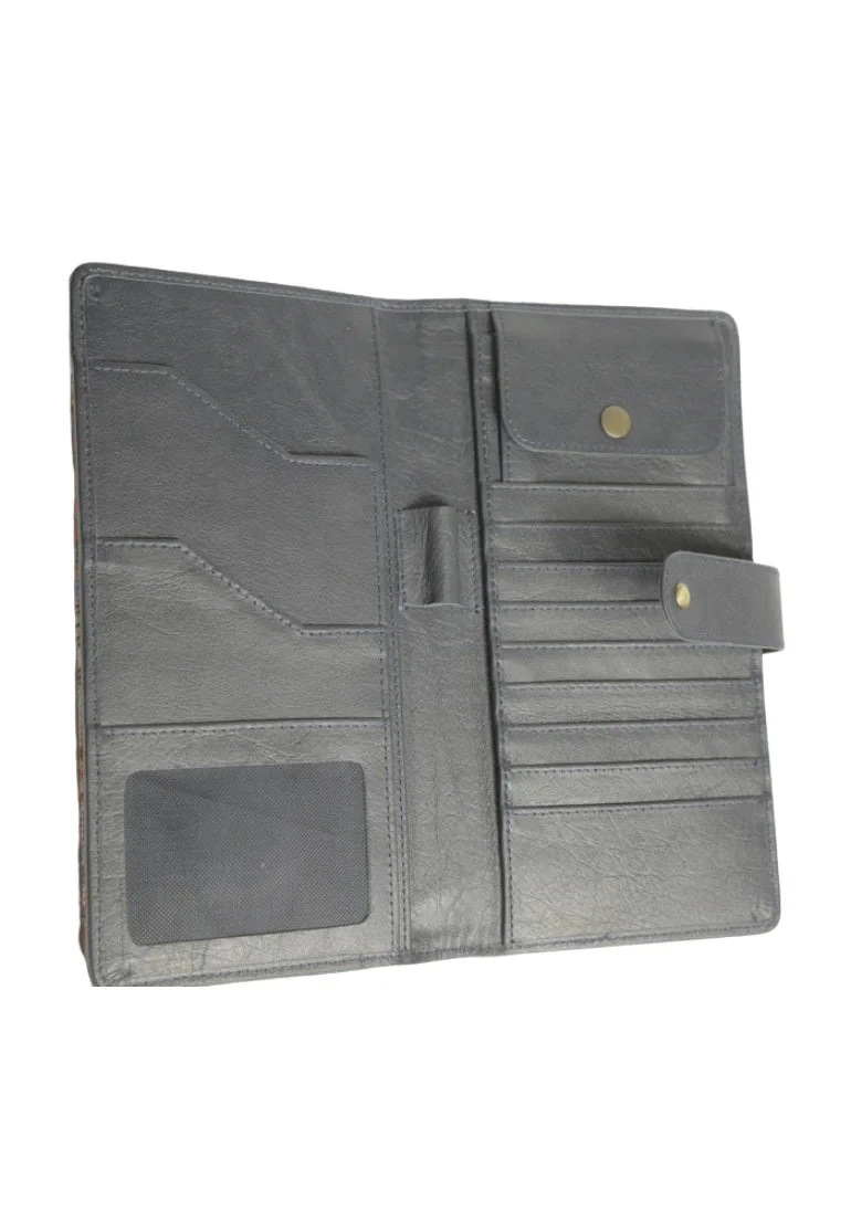 Inside of a tartan travel wallet, grey interior with card slots, pockets and pen loop
