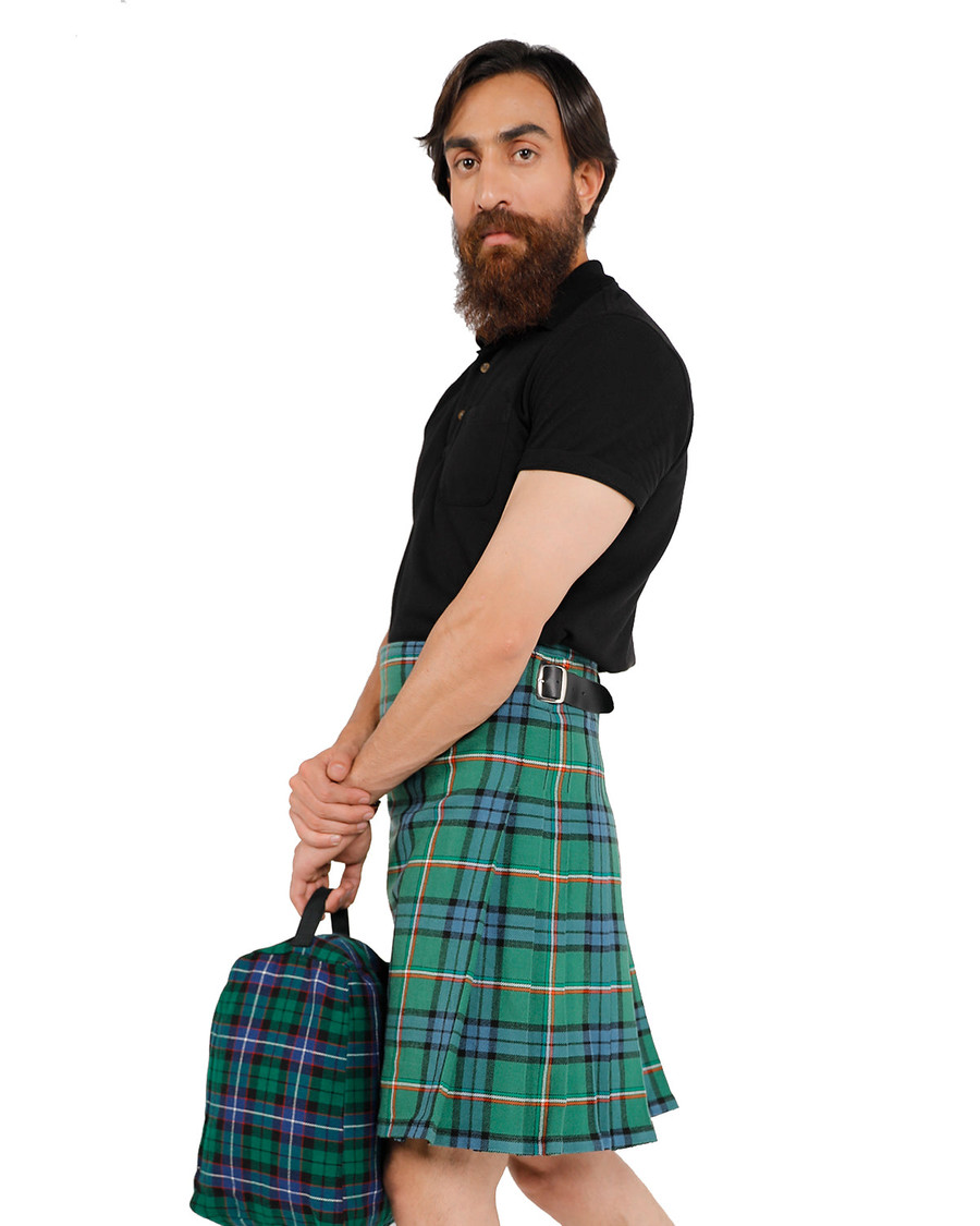 Side view of Irish Diaspora bespoke kilt in green tartan with matching bag
