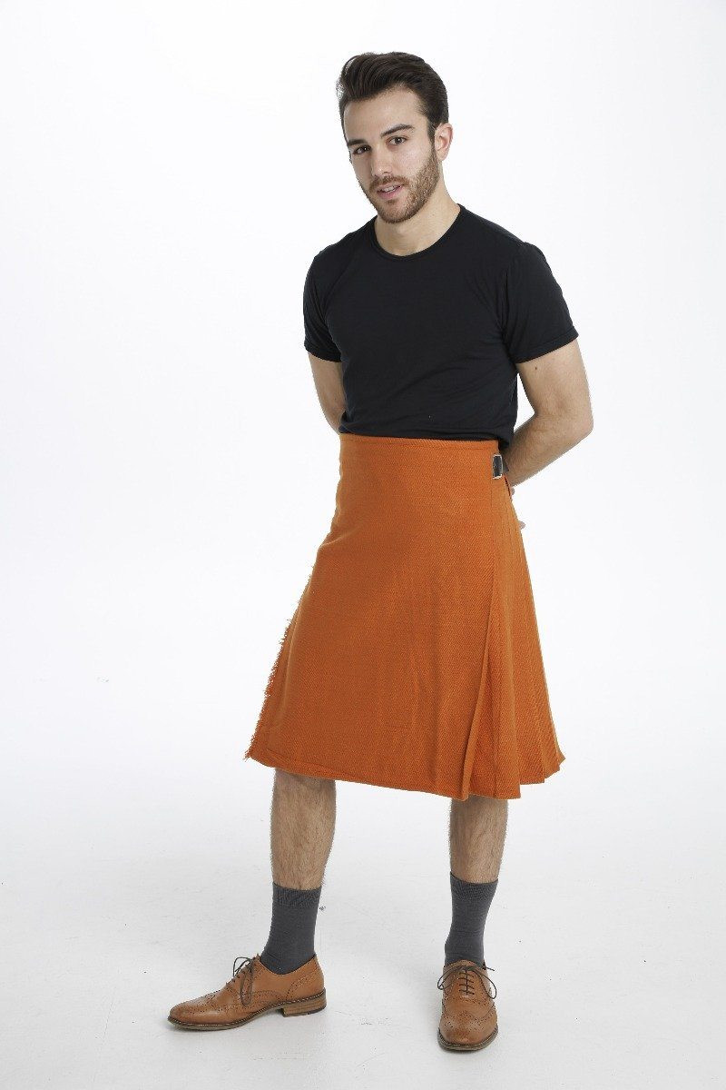 Front view of man in Irish Saffron bespoke kilt with black T-shirt