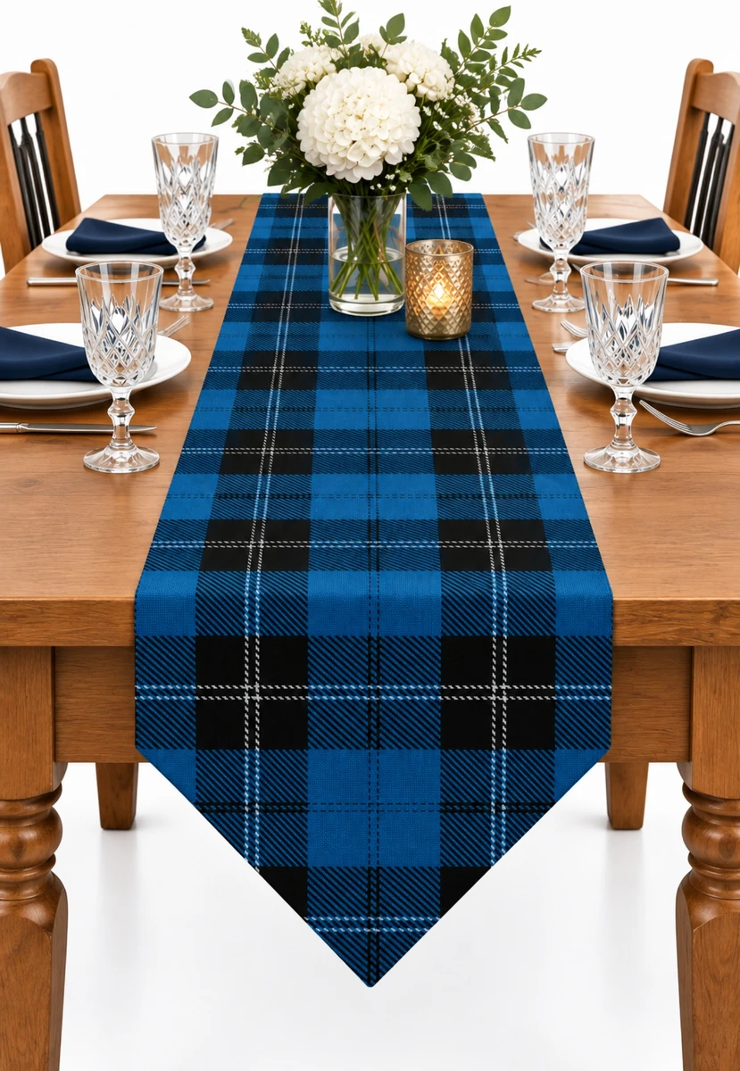 Tartan table runner in blue and black plaid on a set wooden dining table
