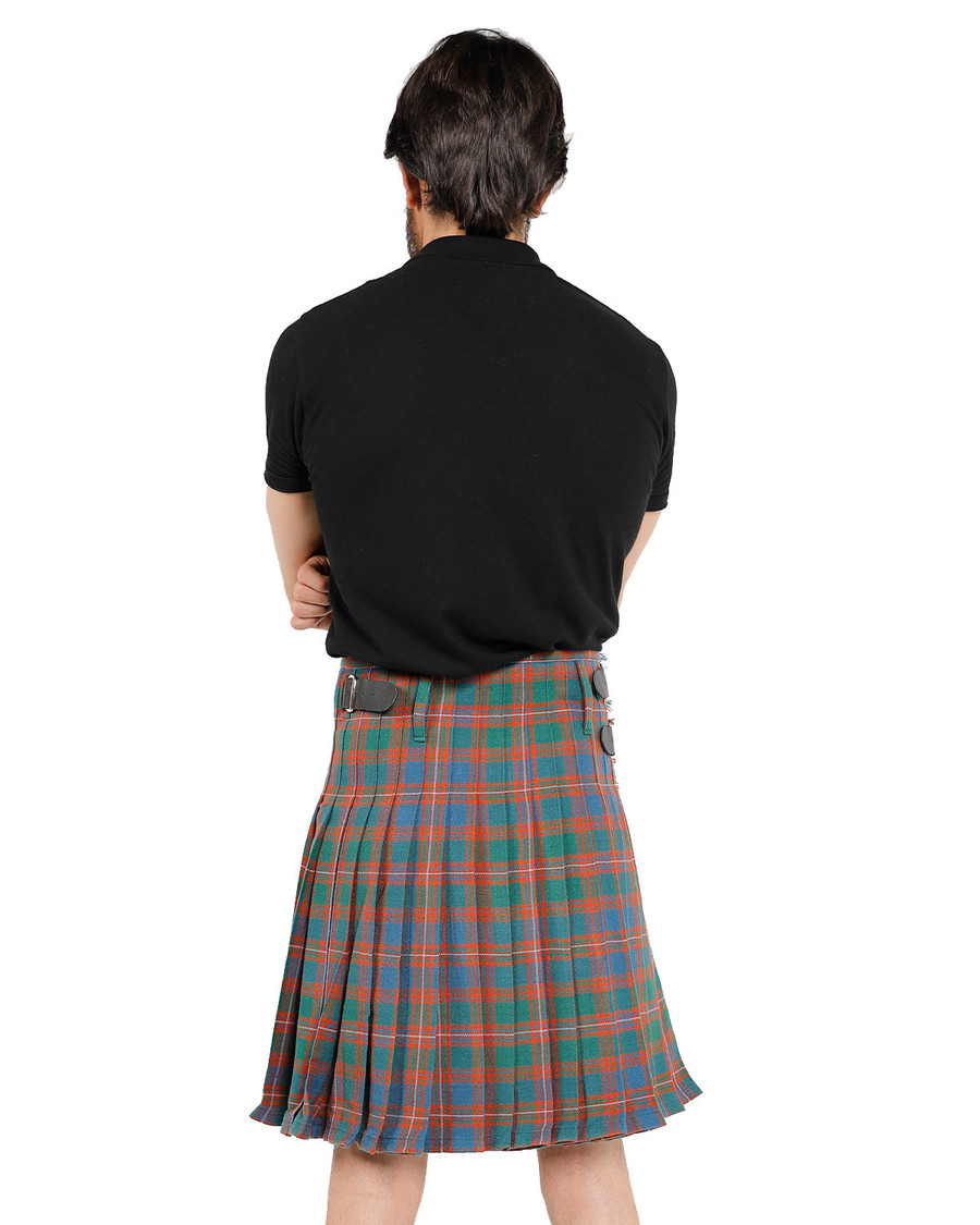 Man wearing a bespoke kilt in purple, pink and black tartan, back view with strap buckles