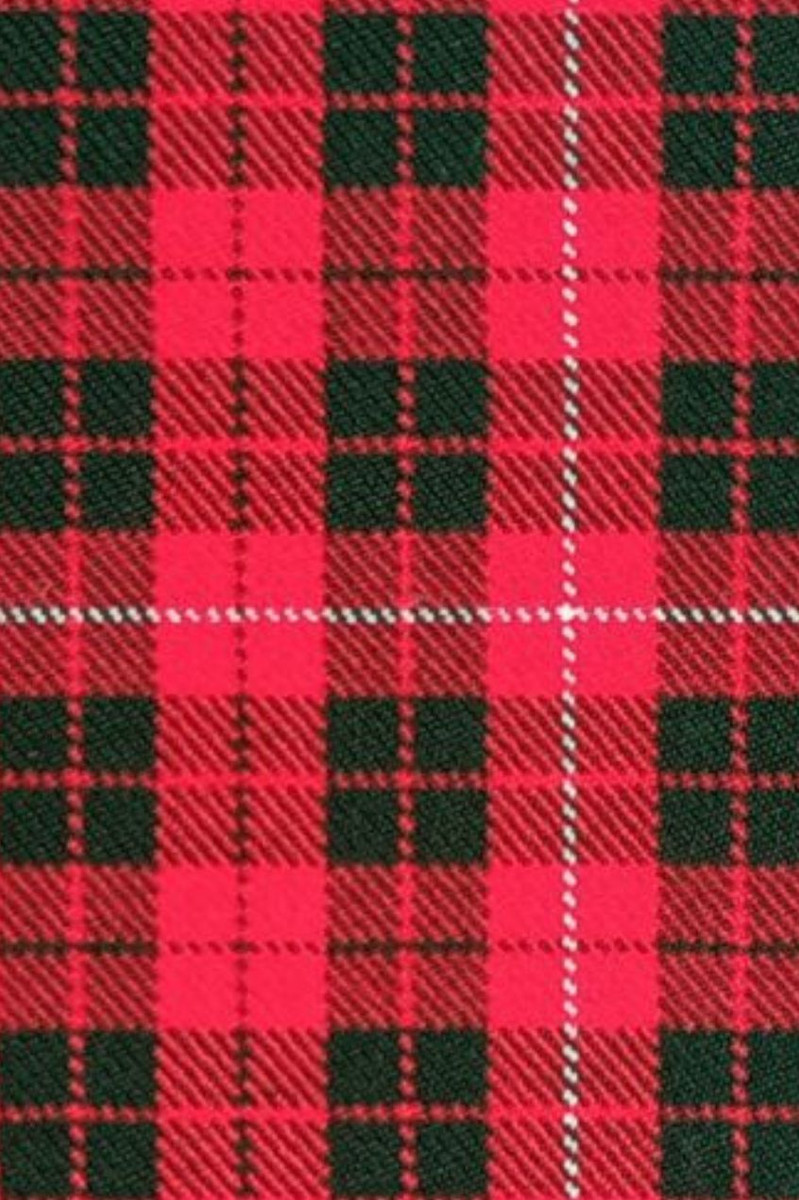Close-up of red tartan fabric with dark green and blue checks for a bespoke kilt