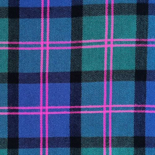 Close-up of red tartan fabric with dark green and blue checks for a bespoke kilt