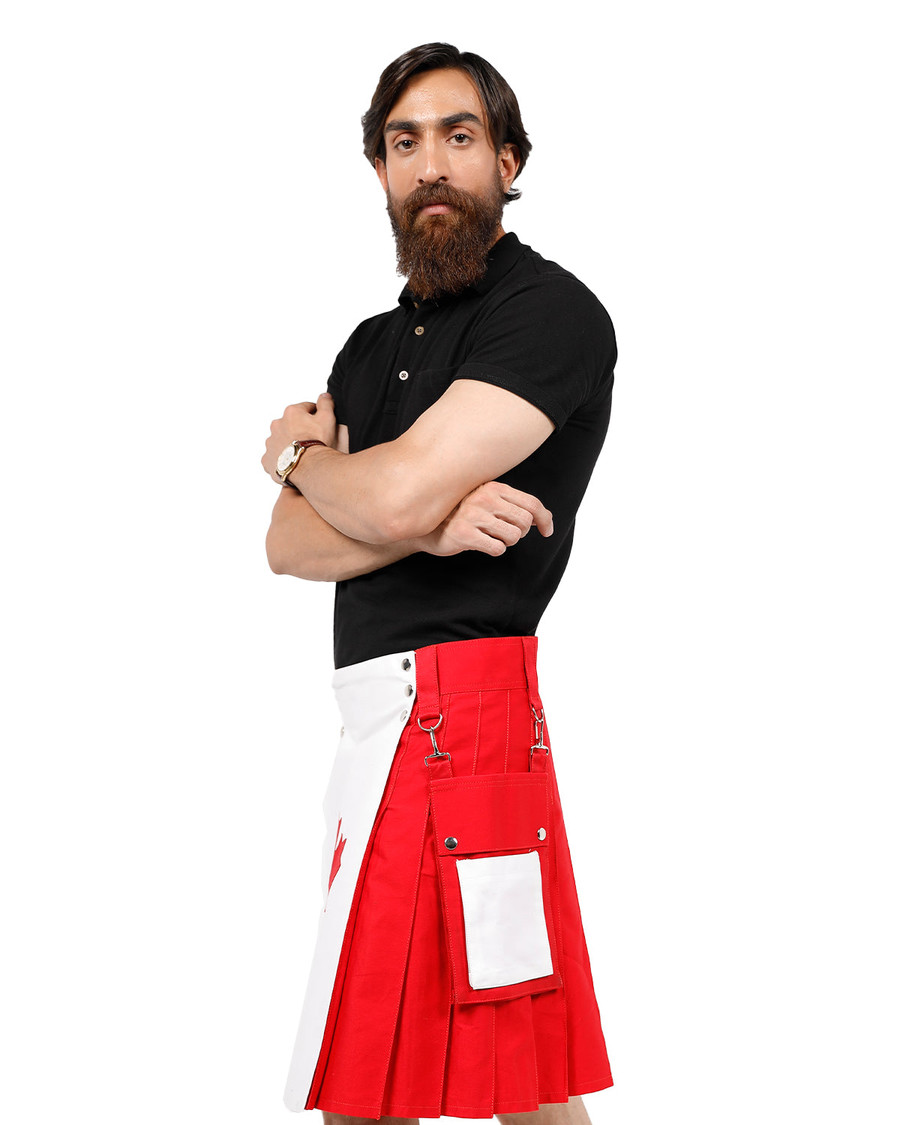 Man with crossed arms in red and white Maple Pride utility kilt, front view