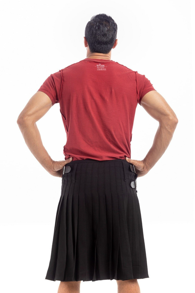 Back view of a plain black kilt showing pleats and side straps