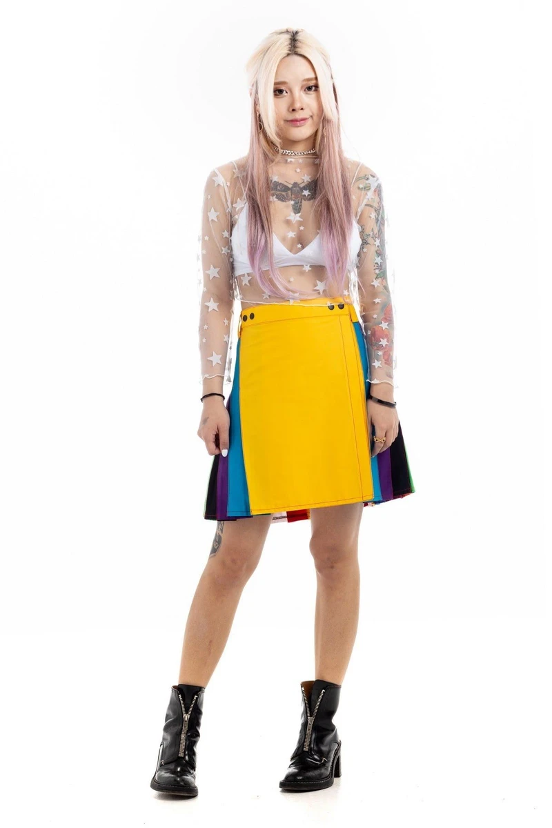 Front view of the skirt with yellow apron and multicolour side pleats