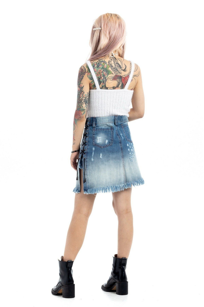 Back view of the faded denim mini skirt with side lace-up detail