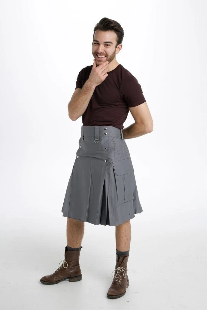 Grey slash pocket kilt front view with side cargo pocket and brown boots