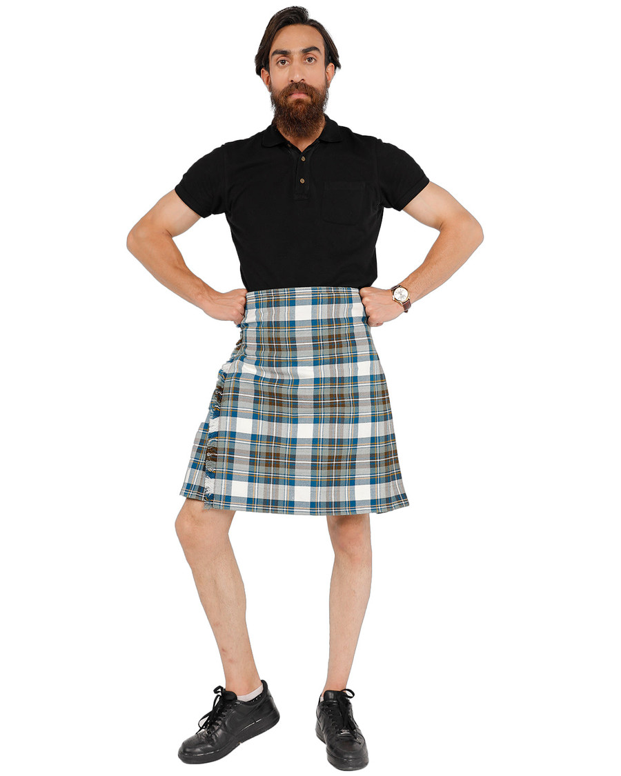 Stewart Dress Blue kilt front view in light tartan, man with hands on hips
