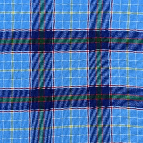 Close-up of red and green tartan fabric with blue, yellow and purple lines
