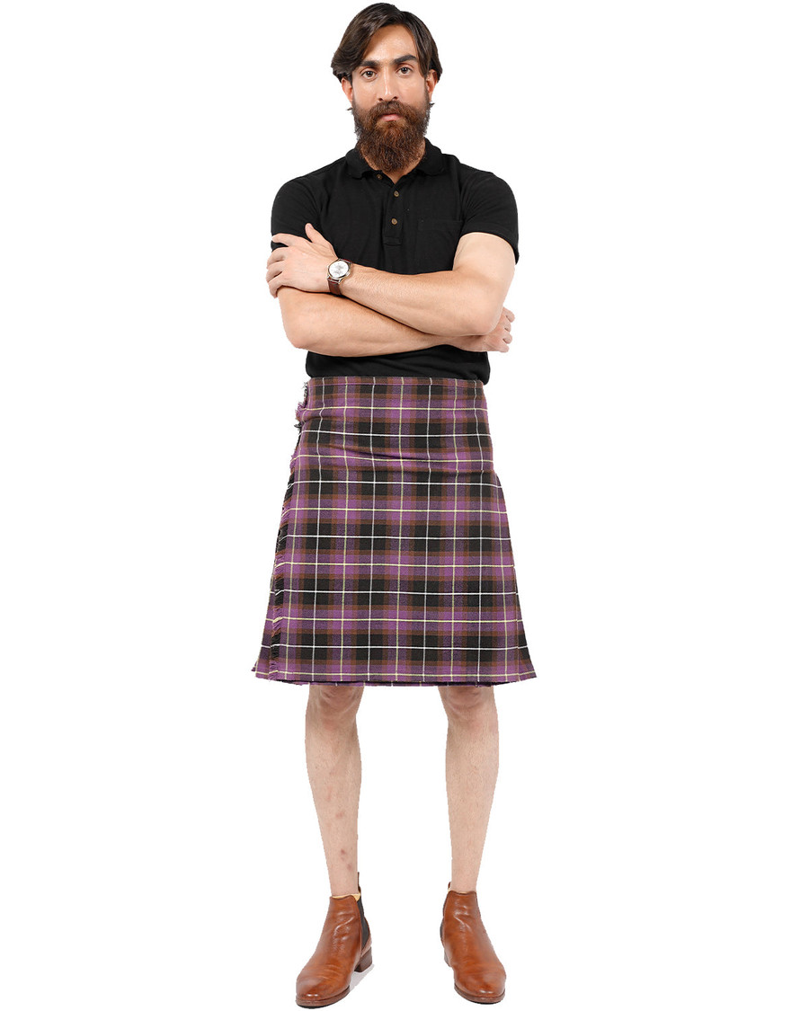 Teylu Coleman kilt front view in purple and grey tartan with brown boots
