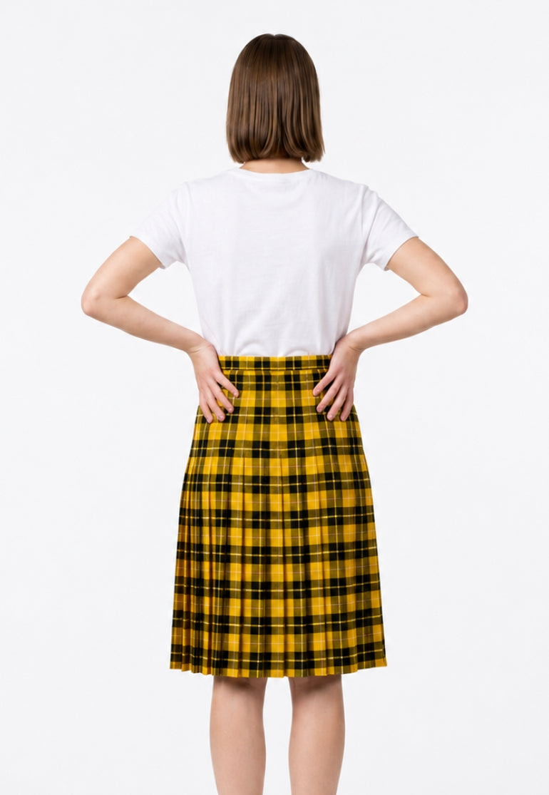 Back view of woman in yellow and black tartan full pleat skirt