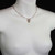 Michal Golan PEARL BLOSSOM - Small Cross Necklace~ N1544 | Adare's Boutique