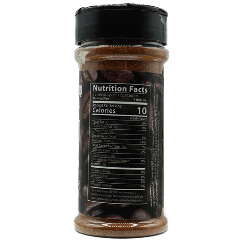 A rear view of the same spice container, displaying the nutritional facts and ingredients list. The label indicates the product contains 10 calories per serving with 0 grams of sugar. Ingredients include paprika, coffee, and various spices. The container also provides serving size information and highlights that it is sugar-free. A rear view of the same spice container, displaying the nutritional facts and ingredients list. The label indicates the product contains 10 calories per serving with 0 grams of sugar. Ingredients include paprika, coffee, and various spices. The container also provides serving size information and highlights that it is sugar-free.
